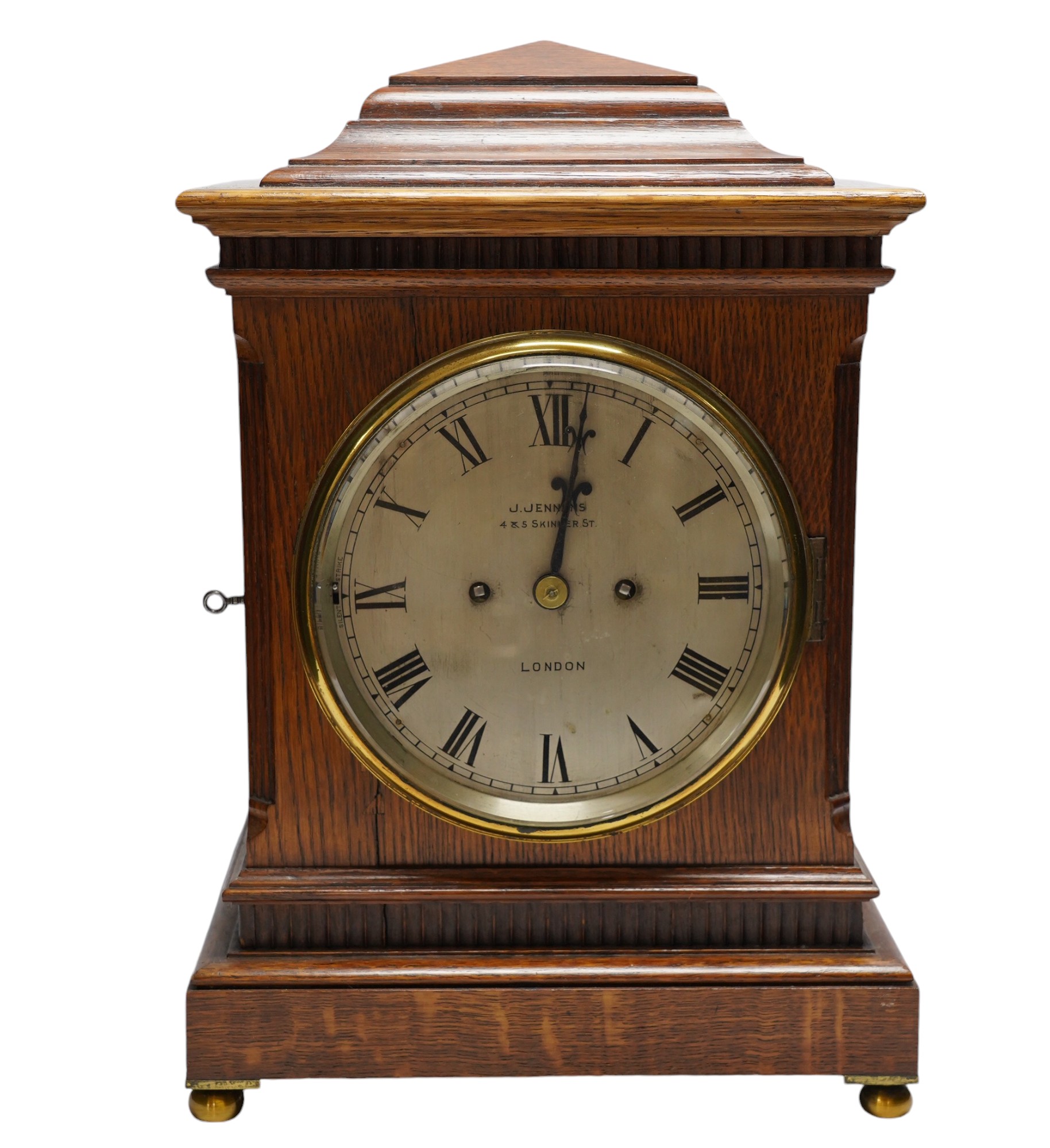 A mid 19th century oak eight day mantel clock, signed J. Jennens, Skinner St. London, pendulum, no key. 45cm. Condition - fair to good, a little faded in areas. Not tested as working